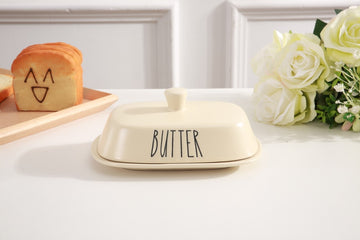 Ixora butter dish off-white ceramic with butter engraved