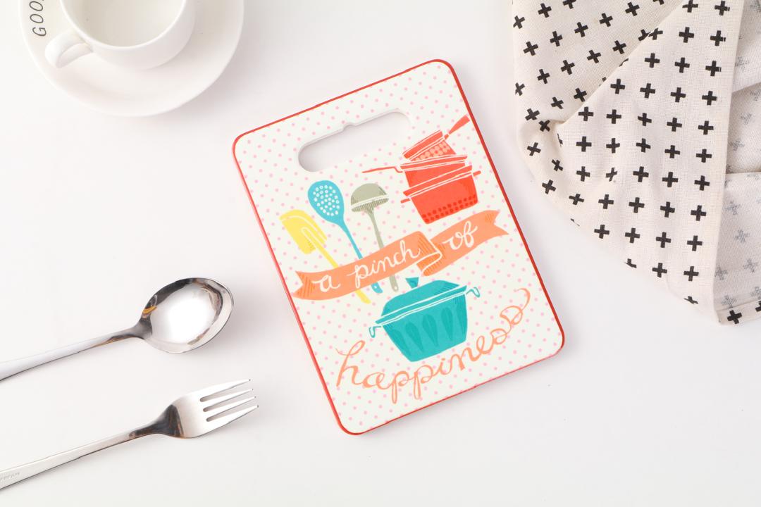 Ixora coaster for hot plate and pan ceramic with wooden base 7.5 cm length 5.5 cm width