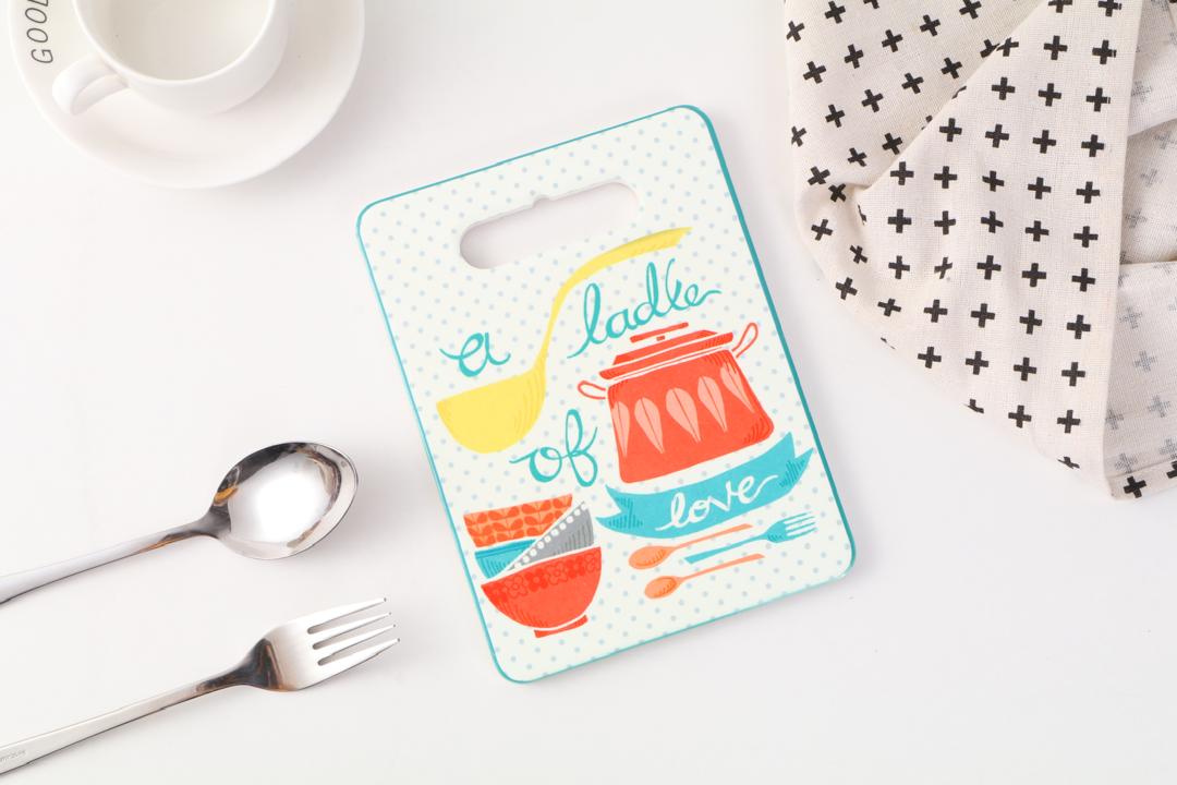Ixora coaster for hot plate and pan ceramic with wooden base 7.5 cm length 5.5 cm width